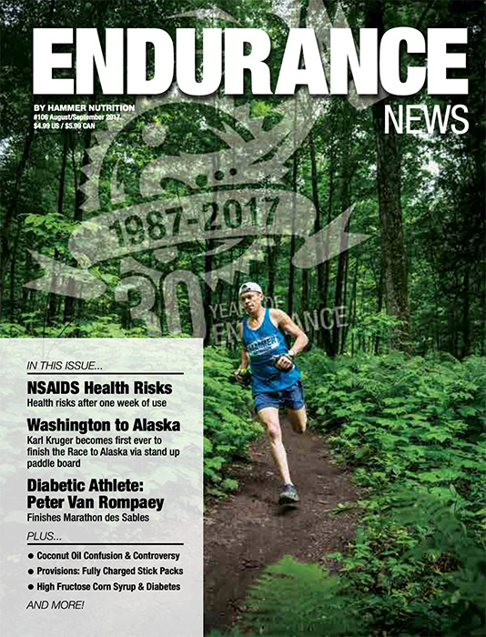 Magazine cover headline Endurance News Magazine with watermark 1987-2017 30 year anniversary. Photo of man in blue sleeveless top and running shorts trail running through trees, magazine highlights in white box. 