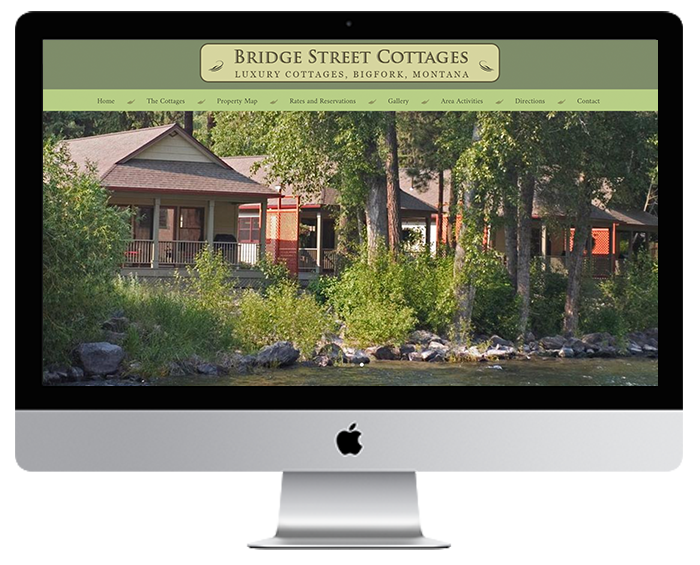 iMac computer screen showing BridgeStreetCottages.com home page design and copy